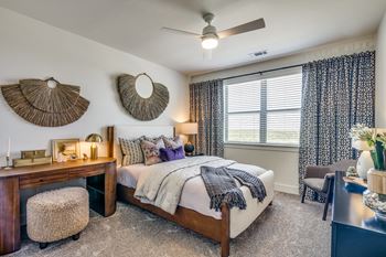 Aura Avant Apartments in Lewisville, Texas Model Bedroom with Carpet